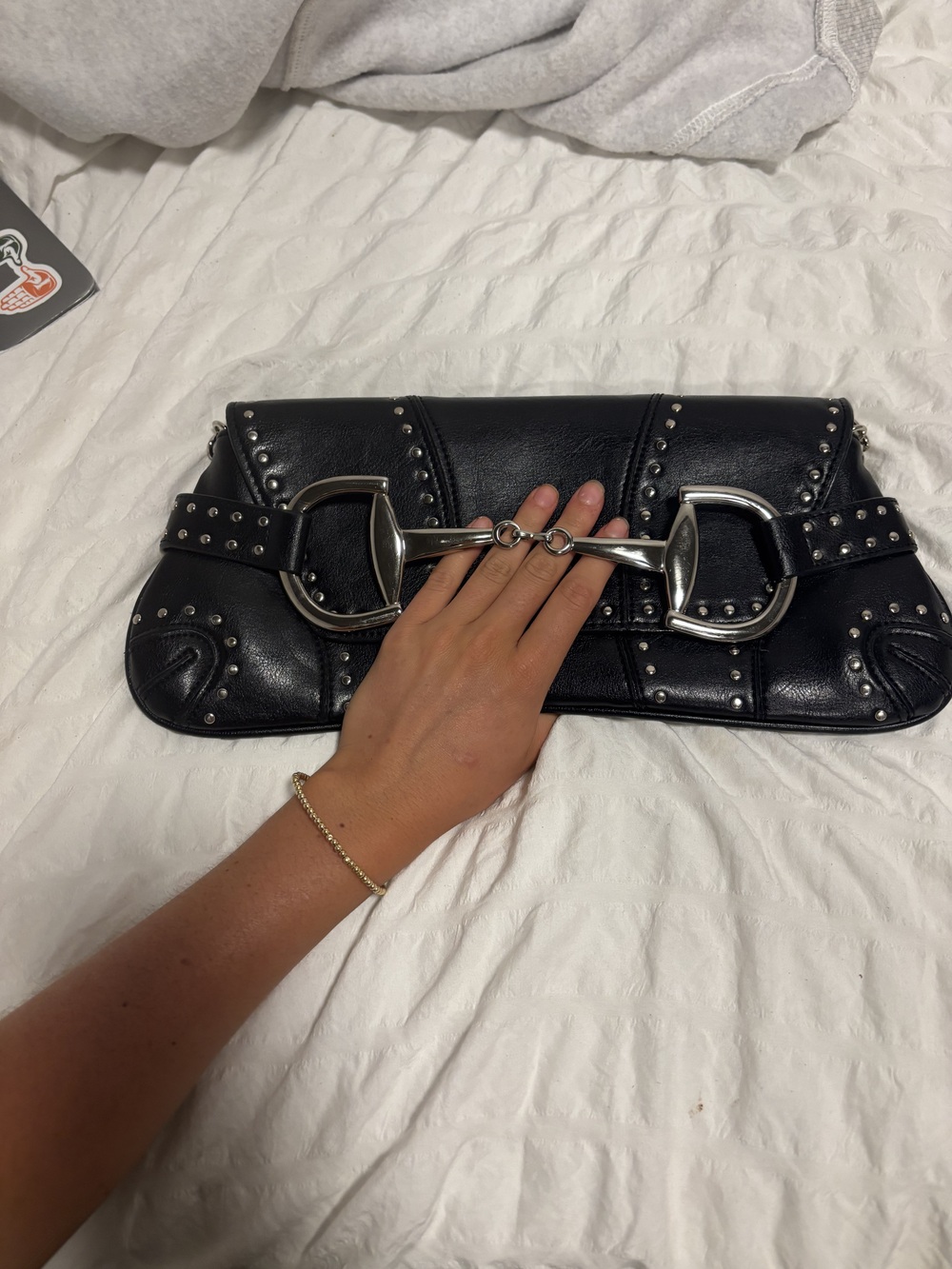 Rina rich horse bit clutch